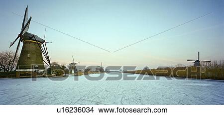 Frozen river in rural landscape View Large Photo Image Picture - Frozen river in rural landscape. Fotosearch