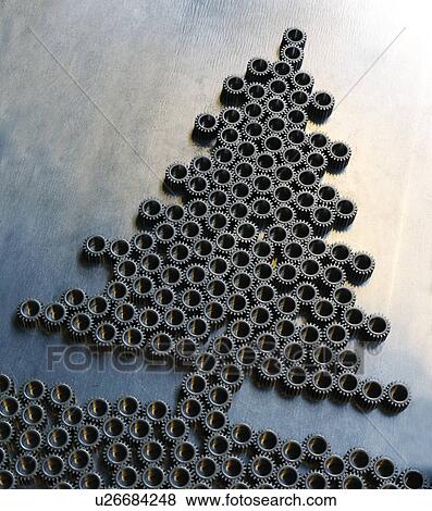 Stock Photo - Gears arranged into Christmas tree shape. Fotosearch
