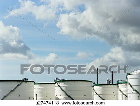 Grain silos under blue sky View Large Photo Image Stock Photo - Grain silos under blue sky. Fotosearch