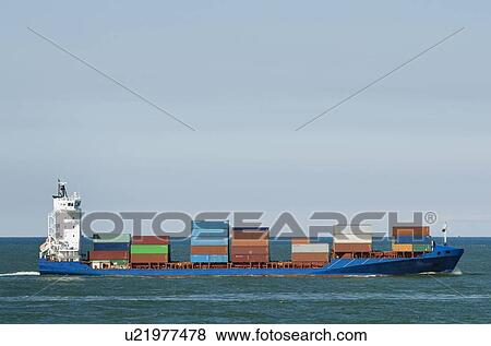 Stock Photo - Industrial barge carrying containers. Fotosearch