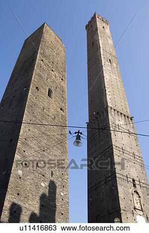 Low angle view of stone towers in city View Large Photo Image Stock Image - Low angle view of stone towers in city. Fotosearch