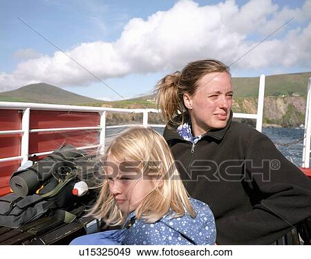 Mother and daughter riding on ferry boat View Large Photo Image Stock Photo - Mother and daughter riding on ferry boat. Fotosearch