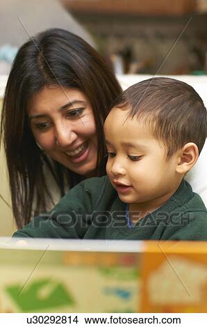 Mother and son using computer View Large Photo Image Picture - Mother and son using computer. Fotosearch