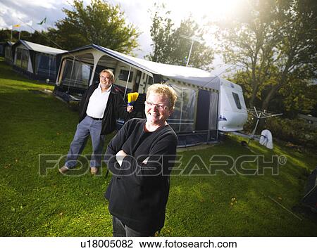 Older couple smiling outside R. V. View Large Photo Image Stock Image - Older couple smiling outside R. V.. Fotosearch