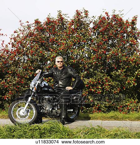 Older man in leather on motorcycle View Large Photo Image Picture - Older man in leather on motorcycle. Fotosearch