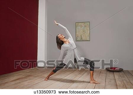 Older woman practicing yoga in studio View Large Photo Image Stock Image - Older woman practicing yoga in studio. Fotosearch