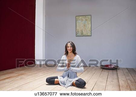 Older woman practicing yoga in studio View Large Photo Image Stock Photo - Older woman practicing yoga in studio. Fotosearch