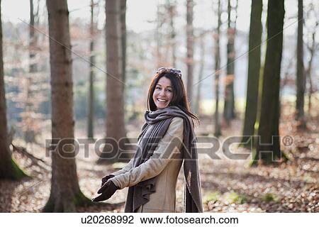 Older woman walking in forest View Large Photo Image Stock Image - Older woman walking in forest. Fotosearch
