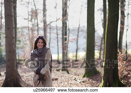 Older woman walking in forest View Large Photo Image Stock Photo - Older woman walking in forest. Fotosearch