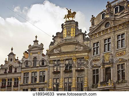 Stock Image - Ornate apartments on city street. Fotosearch