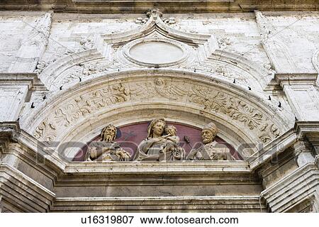 Ornate relief carvings on building wall View Large Photo Image Stock Photo - Ornate relief carvings on building wall. Fotosearch