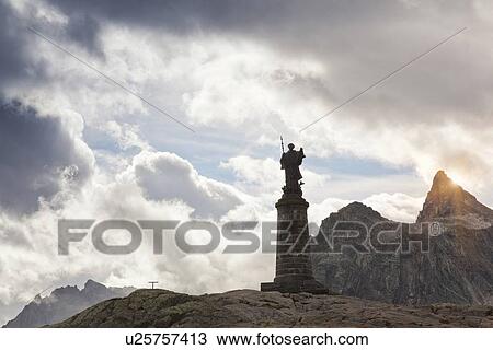 Ornate statue on rocky mountaintop View Large Photo Image Stock Image - Ornate statue on rocky mountaintop. Fotosearch