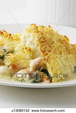 Plate of fish pie with potatoes View Large Photo Image Stock Image - Plate of fish pie with potatoes. Fotosearch