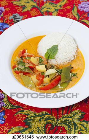 Stock Photography - Plate of red curry and rice. Fotosearch