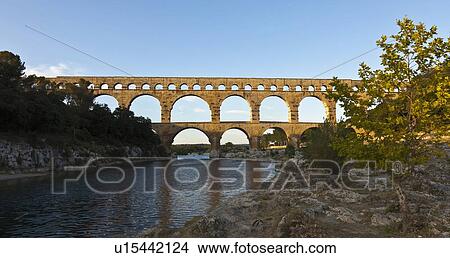 Picture - Pont du Gard bridge over river. Fotosearch
