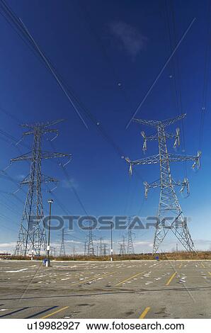 Stock Photo - Power lines against blue sky. Fotosearch