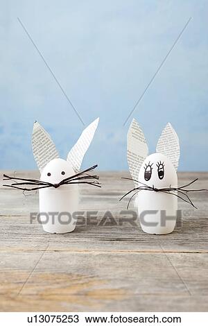 Rabbit decorations on wood counter View Large Photo Image Stock Image - Rabbit decorations on wood counter. Fotosearch