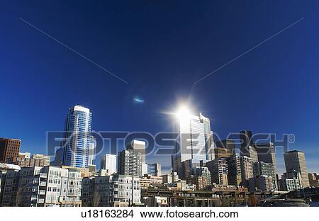 Picture - Seattle city skyline against blue sky. Fotosearch
