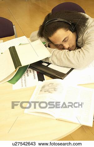 Student sleeping at desk View Large Photo Image Stock Image - Student sleeping at desk. Fotosearch