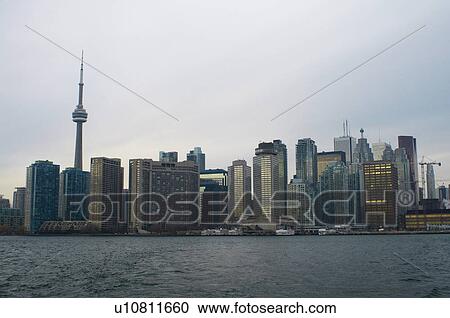 Stock Image - Toronto city skyline on water. Fotosearch