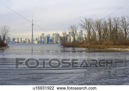 Stock Image - Toronto city skyline on water. Fotosearch