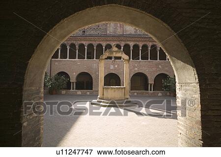 Town well viewed through archway View Large Photo Image Stock Photo - Town well viewed through archway. Fotosearch