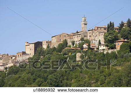 Stock Image - Village built on rural hillside. Fotosearch