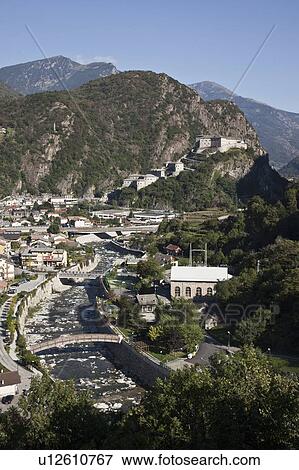 Stock Photo - Village roofs in rural valley. Fotosearch