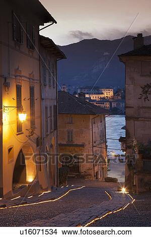 Picture - Village street lit up at Christmas. Fotosearch