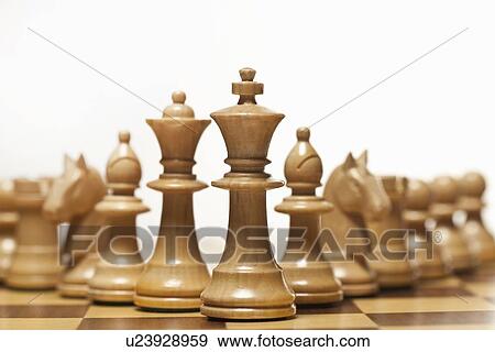 White chess set on board View Large Photo Image Stock Photo - White chess set on board. Fotosearch