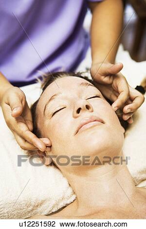 Woman having scalp massage in spa View Large Photo Image Stock Image - Woman having scalp massage in spa. Fotosearch