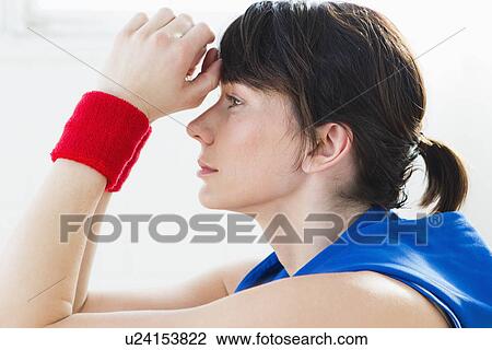 Woman resting forehead in hands View Large Photo Image Stock Image - Woman resting forehead in hands. Fotosearch