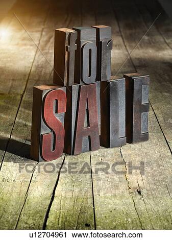 Stock Image - Wooden blocks spelling for sale. Fotosearch