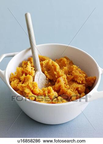 Stock Photograph - Bowl of mashed sweet potatoes. Fotosearch