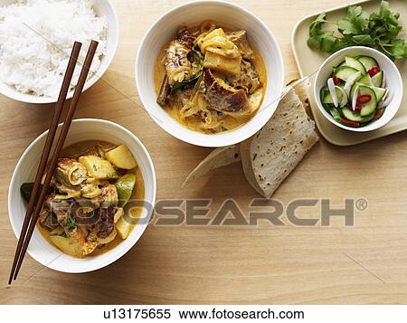 Bowls of curry and rice View Large Photo Image Stock Photography - Bowls of curry and rice. Fotosearch