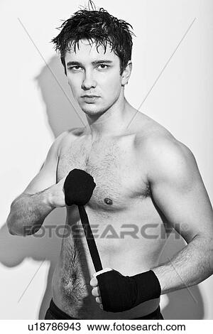Boxer wrapping his hands View Large Photo Image Stock Image - Boxer wrapping his hands. Fotosearch