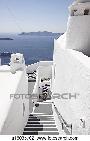Boy climbing staircase outdoors View Large Photo Image Stock Image - Boy climbing staircase outdoors. Fotosearch