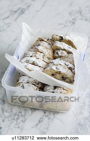 Bread in butcher paper in tupperware View Large Photo Image Stock Image - Bread in butcher paper in tupperware. Fotosearch