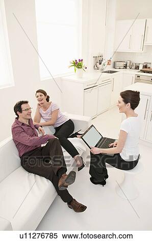 Business people talking in break room View Large Photo Image Stock Photography - Business people talking in break room. Fotosearch
