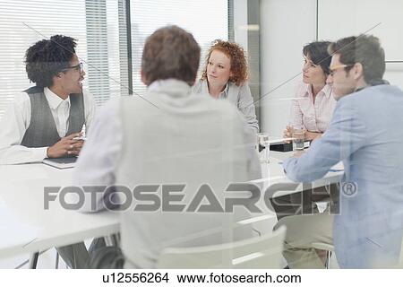Business people talking in meeting View Large Photo Image Picture - Business people talking in meeting. Fotosearch