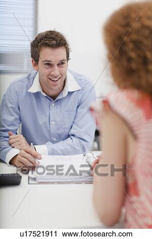 Business people talking in office View Large Photo Image Stock Image - Business people talking in office. Fotosearch