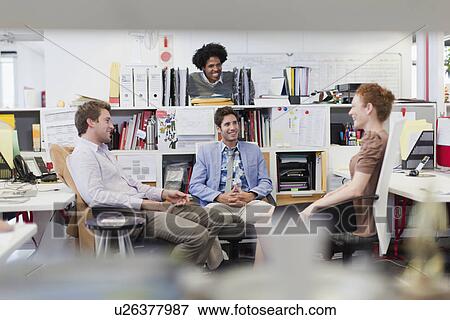 Business people talking in office View Large Photo Image Stock Photo - Business people talking in office. Fotosearch