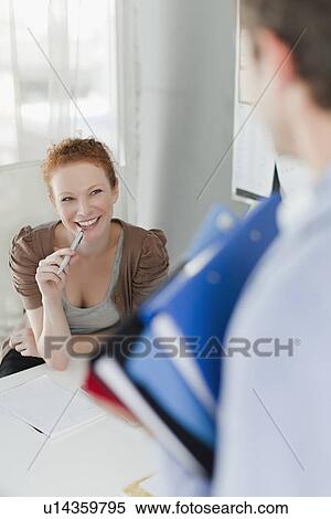 Business people talking in office View Large Photo Image Stock Photography - Business people talking in office. Fotosearch