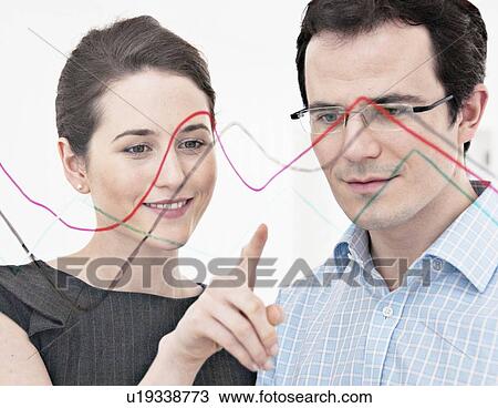 Businesswoman pointing to graph View Large Photo Image Stock Image - Businesswoman pointing to graph. Fotosearch
