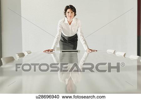 Businesswoman reflected in table View Large Photo Image Stock Image - Businesswoman reflected in table. Fotosearch