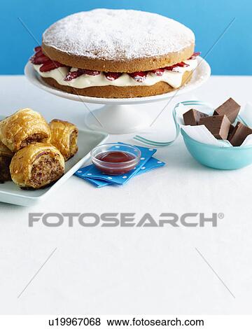 Cake, baklava and chocolate on table View Large Photo Image Stock Photo - Cake, baklava and chocolate on table. Fotosearch