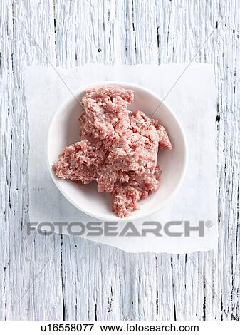Stock Photo - Close up of bowl of ground pork. Fotosearch