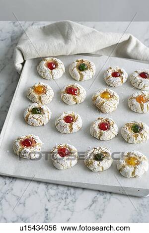 Close up of cookies on baking sheet View Large Photo Image Stock Photograph - Close up of cookies on baking sheet. Fotosearch