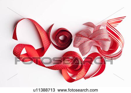Close up of decorative red ribbons View Large Photo Image Stock Image - Close up of decorative red ribbons. Fotosearch