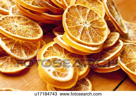 Close up of dried orange slices View Large Photo Image Stock Image - Close up of dried orange slices. Fotosearch